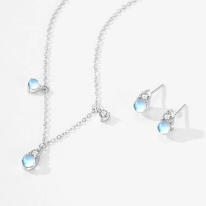 Parure de bijoux élégante en argent S925 avec pendentifs pierre de lune et éclats diamant