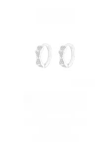 Detailed close-up of S925 sterling silver bow earrings with sparkling cubic zirconia stones