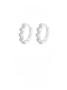 Close-up of S925 sterling silver hoop earrings with shimmering wavy zircon stone setting