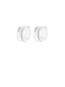 Macro shot of silver Moebius earrings with double-layered pavé set cubic zirconia