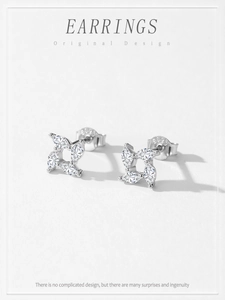 Detail of S925 sterling silver windmill earrings featuring marquise-cut zircon stones
