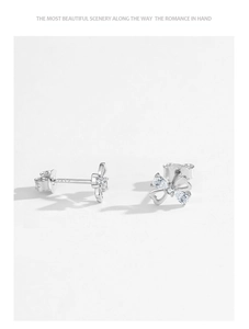 Detailed view of S925 sterling silver bow earrings with sparkling cubic zirconia stones