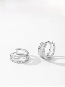 Detail of S925 silver double-layered earrings with mother-of-pearl and micro-set zircons