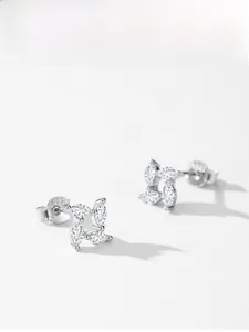 Detail view of S925 sterling silver windmill studs with sparkling zircon stones