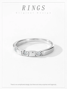 Close-up of S925 sterling silver geometric ring with three sparkling round zircons