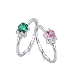 S925 silver rings with emerald green and pink round zircons in a luxury crossed layout