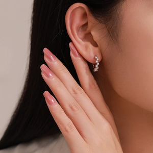 Sparkling S925 sterling silver bubble hoop earrings with cubic zirconia on model