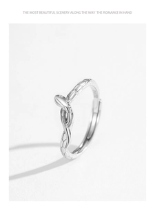 Detail of 925 sterling silver snake ring showing intricate scale texture and polished finish