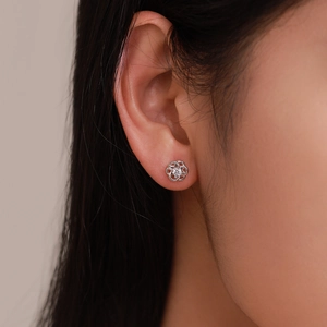 Minimalist S925 sterling silver hollow flower stud earring with sparkling central zircon