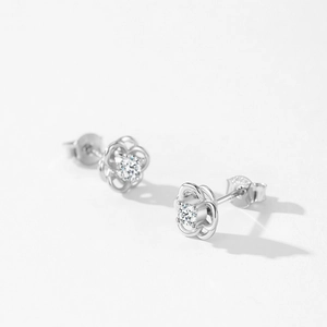 Elegant S925 sterling silver hollow flower stud earrings with sparkling cubic zirconia
