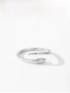 Macro view of 925 sterling silver snake ring with marquise-cut white zircon accent