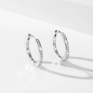 Elegant S925 sterling silver hoop earrings featuring micro-set zircon in a minimalist style