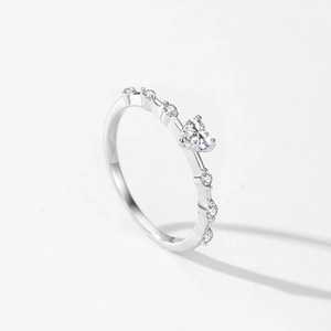 Sparkling 925 sterling silver heart shaped ring with cubic zirconia side stones