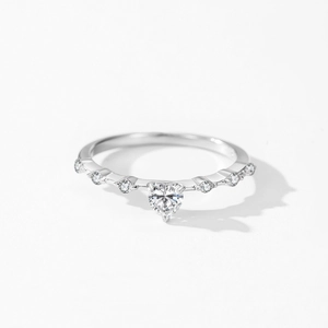 Elegant 925 sterling silver heart ring with shimmering pavé diamonds on a white background