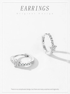 Detailed close-up of S925 sterling silver star hoop earrings with micro-set zircon stones