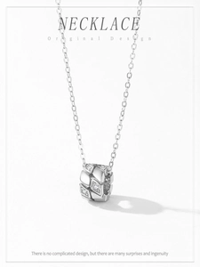 Close-up of S925 silver necklace featuring a quilted pattern pendant with sparkling zircons