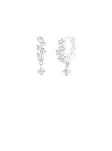 Detail of 925 sterling silver hoop earrings with square cut dangling charms and crystals