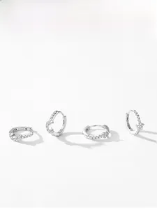 Detailed view of S925 sterling silver hoop earrings with micro-inlaid zircon stars