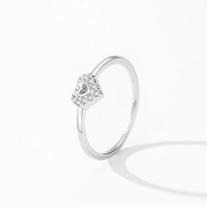 Elegant S925 sterling silver hollow heart ring featuring sparkling pavé cubic zirconia