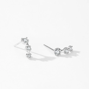 Elegant S925 sterling silver stud earrings with three sparkling zircons in a curved design