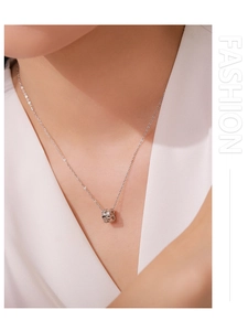 Detail shot of a S925 sterling silver ice cube pendant with sparkling micro-diamonds
