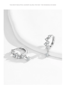 Detailed view of S925 sterling silver hoop earrings with sparkling zircon dangles