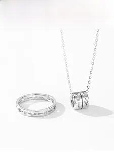 Detailed close-up of S925 sterling silver stamp on minimalist hollow geometric ring