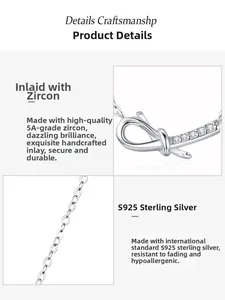 Detailed macro view of S925 sterling silver bow pendant with shimmering 5A cubic zirconia