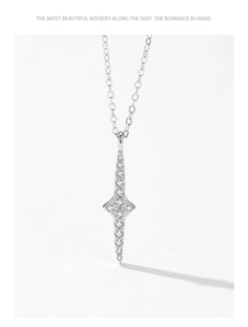Detail view of S925 sterling silver four-pointed star necklace with pavé zircon stones