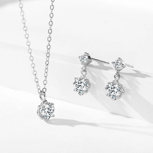Elegant 925 sterling silver jewelry set featuring twin floral zircon studs and necklace