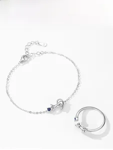 Detail view of S925 sterling silver cat jewelry set with deep blue sapphire gemstone
