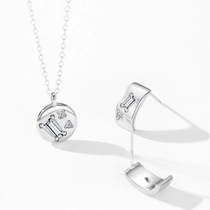 925 sterling silver jewelry set featuring round pendant necklace and J-hoop earrings