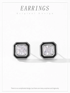 Detailed view of S925 sterling silver octagonal earrings with square cubic zirconia