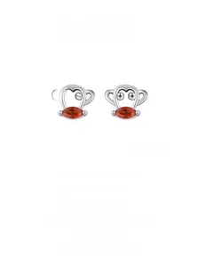 Detail of S925 sterling silver monkey stud earrings featuring red marquise-cut stones