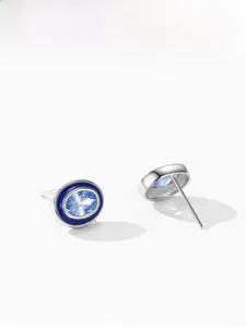 Detail of S925 sterling silver oval stud earring with light blue zircon and enamel finish