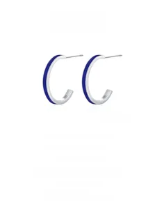 Close-up of S925 sterling silver C-shaped earrings with royal blue enamel finish