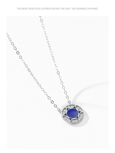 Detail of S925 silver star pendant necklace with royal blue enamel and zircon inlay