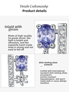 Macro detail of S925 sterling silver earrings with 5A purple and white zircons