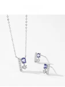 Detail of s925 silver jewelry set featuring purple oval stones and zircon accents