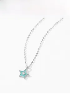 Close-up of S925 silver star pendant with light blue enamel and a sparkling zircon center