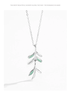 Detailed close-up of 925 sterling silver leaf pendant necklace with green enamel finish