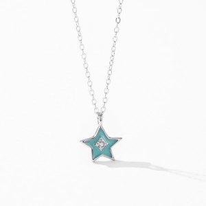 925 silver necklace featuring a teal enamel star pendant with a sparkling center zircon