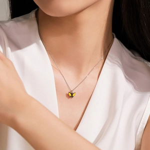 Minimalist 925 sterling silver necklace featuring a cute yellow enamel butterfly pendant