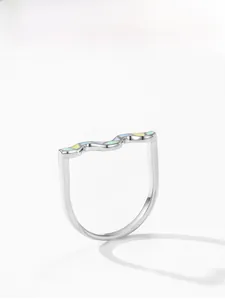 Close-up of wave-shaped 925 silver ring with colorful rainbow enamel inlay details