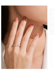 Detail of 925 sterling silver ring with screw motifs and pavé cubic zirconia accents
