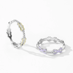 Elegant S925 sterling silver ring featuring purple enamel accents and heart-shaped cutouts