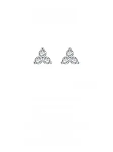 Macro detail of 925 sterling silver mini flower studs with three-stone zircon triangles