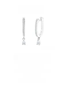 Macro detail of S925 sterling silver U-shaped hoop earrings with pear-cut drop stones