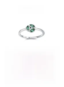 Macro detail of S925 sterling silver ring featuring three marquise-cut green gemstones