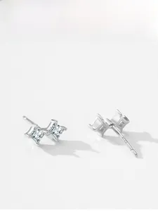 Detailed close-up of S925 sterling silver square zircon stud earrings on white background